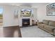 Gathering room with gas fireplace and access to back deck at 1414 Kings Grove Dr, York, SC 29745