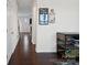 Hardwood floor hallway with a view into the living room at 1414 Kings Grove Dr, York, SC 29745