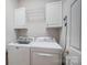 Laundry room with washer, dryer, and cabinets at 2010 Olde Oxford Ct, Rock Hill, SC 29732