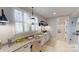 Bathroom with double vanity and a view into the laundry room at 2026 Thatcher Way, Fort Mill, SC 29715