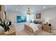 Coastal-themed bedroom with large window and artwork at 2026 Thatcher Way, Fort Mill, SC 29715