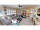 Comfortable bonus room featuring a sectional sofa and plenty of natural light at 2026 Thatcher Way, Fort Mill, SC 29715