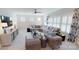 Spacious bonus room with L-shaped sectional sofa and large windows at 2026 Thatcher Way, Fort Mill, SC 29715