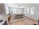 Bright dining room features a wooden table, chairs, and stylish light fixture at 2026 Thatcher Way, Fort Mill, SC 29715