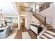 Two-story entryway with hardwood floors and curved staircase at 2026 Thatcher Way, Fort Mill, SC 29715