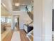 Bright entryway with hardwood floors and staircase at 2026 Thatcher Way, Fort Mill, SC 29715
