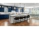 Spacious kitchen with blue cabinetry and large center island at 2026 Thatcher Way, Fort Mill, SC 29715