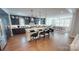 Modern kitchen with dark cabinetry, large island, and stainless steel appliances at 2026 Thatcher Way, Fort Mill, SC 29715