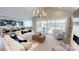 Open living room with kitchen and access to backyard patio at 2026 Thatcher Way, Fort Mill, SC 29715