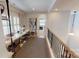 Open loft with built-in shelving and desks, offering a versatile workspace at 2026 Thatcher Way, Fort Mill, SC 29715