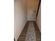 Welcoming hallway with hardwood floors, a patterned rug, and ample natural light at 23010 Clarabelle Dr, Charlotte, NC 28273