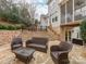 Stone patio with seating area and access to home at 3540 Keithcastle Ct, Charlotte, NC 28210