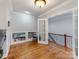 Bright playroom with built-in shelving and hardwood floors at 3540 Keithcastle Ct, Charlotte, NC 28210