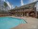 Relaxing pool area with ample deck space for lounging at 4022 Old Pageland Marshville Rd, Wingate, NC 28174