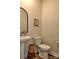 Small bathroom with white toilet and sink at 508 Cranford Dr, Pineville, NC 28134