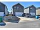 Rear view of houses with attached garages and parking at 508 Cranford Dr, Pineville, NC 28134