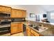 Kitchen features stainless steel appliances and granite countertops at 6275 Alyssum Pl, Denver, NC 28037