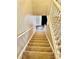 Indoor staircase leading to the upper level of the home at 701 Victorian Ln, Monroe, NC 28112