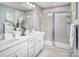 Elegant bathroom with double vanity, large shower, and modern fixtures at 7232 Hodges Meadow Ln, Charlotte, NC 28213
