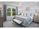 Main bedroom with a king-size bed, stylish decor, and ample natural light at 7232 Hodges Meadow Ln, Charlotte, NC 28213