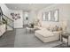 Bright living room with L-shaped sofa, large windows and neutral decor at 7232 Hodges Meadow Ln, Charlotte, NC 28213