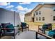 Private patio area with comfortable seating, ideal for outdoor relaxation and entertaining at 7232 Hodges Meadow Ln, Charlotte, NC 28213