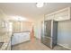 Well-lit kitchen with stainless steel appliances, granite countertops, and ample cabinet space at 738 Brockbank Rd, Charlotte, NC 28209