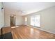 Bright living room features hardwood floors and lots of natural light at 738 Brockbank Rd, Charlotte, NC 28209