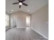 Well-lit bedroom with a ceiling fan, gray vinyl floors, and a closet at 8690 Crestwood Dr, Mount Pleasant, NC 28124