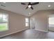 Bright bedroom with vaulted ceiling, ceiling fan, and natural light from two windows at 8690 Crestwood Dr, Mount Pleasant, NC 28124