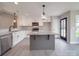 Stylish kitchen featuring white cabinets, granite countertops, and stainless steel appliances at 8690 Crestwood Dr, Mount Pleasant, NC 28124