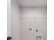 A utility room with wire shelving, gray walls and hookups at 8690 Crestwood Dr, Mount Pleasant, NC 28124