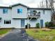 Gray siding two-story house with deck at 8700 Baraka Pl # D, Waxhaw, NC 28173