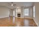 Living room boasts hardwood floors, fireplace and built-in shelves at 9140 Providence Colony Dr, Charlotte, NC 28277