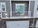 Private balcony with table and chairs at 1028 Sharon Towns Dr, Charlotte, NC 28210