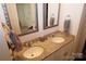 Double vanity bathroom with granite countertop and updated fixtures at 1028 Sharon Towns Dr, Charlotte, NC 28210