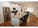Open concept kitchen with granite countertops and island at 1028 Sharon Towns Dr, Charlotte, NC 28210