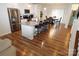 Open concept kitchen with granite countertops and island at 1028 Sharon Towns Dr, Charlotte, NC 28210