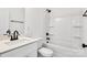 Clean bathroom with a tub, shower, and white vanity at 1077 Gibson St, Albemarle, NC 28001
