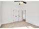 Bright bedroom with carpet, double doors and ceiling fan at 1077 Gibson St, Albemarle, NC 28001