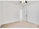 Well-lit bedroom with ceiling fan and carpet at 1077 Gibson St, Albemarle, NC 28001