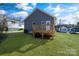 Backyard deck and gray house exterior at 1077 Gibson St, Albemarle, NC 28001