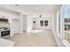 Bright living room with kitchen, wood floors and lots of natural light at 1077 Gibson St, Albemarle, NC 28001