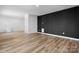 Unfinished basement with an accent wall at 115 Brentwood Dr, Maiden, NC 28650