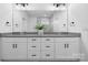 Double vanity with grey countertop and white cabinets at 115 Brentwood Dr, Maiden, NC 28650
