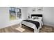 Cozy bedroom with a bed and large window at 115 Brentwood Dr, Maiden, NC 28650