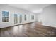 Spacious bonus room with wood flooring and large windows at 115 Brentwood Dr, Maiden, NC 28650