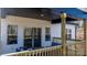 Covered back deck with seating area and fire pit at 115 Brentwood Dr, Maiden, NC 28650