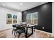 Dining area with a dark wood table and black chairs near the kitchen at 115 Brentwood Dr, Maiden, NC 28650