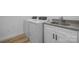 White cabinets and countertop, new washer and dryer at 115 Brentwood Dr, Maiden, NC 28650